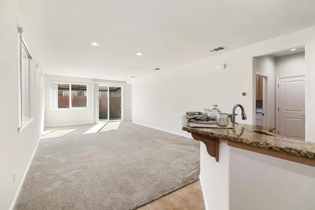 a view of a kitchen with a sink