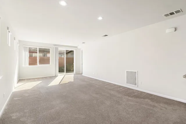 a view of empty room with a window