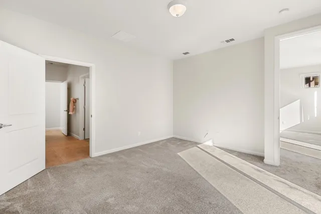 a bathroom with a sink double vanity granite and a mirror