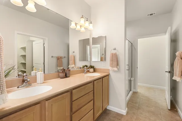 a bathroom with a shower and a toilet