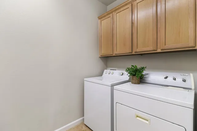 a front view of a house with a garage