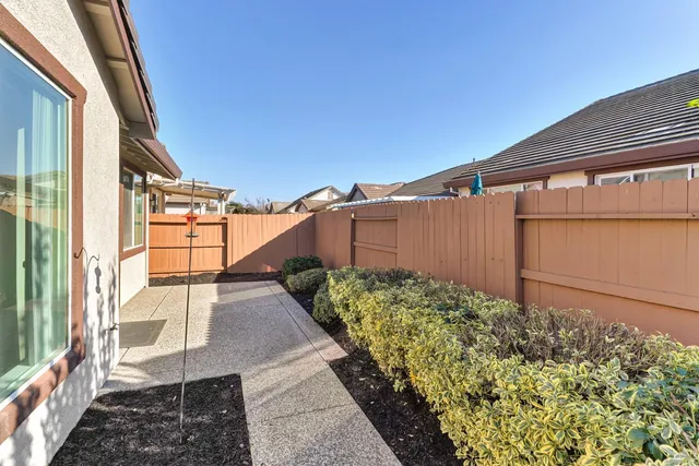 a backyard of a house with lots of green space
