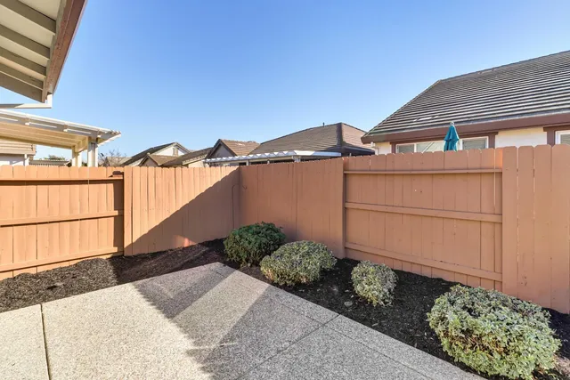 a view of a back yard of the house