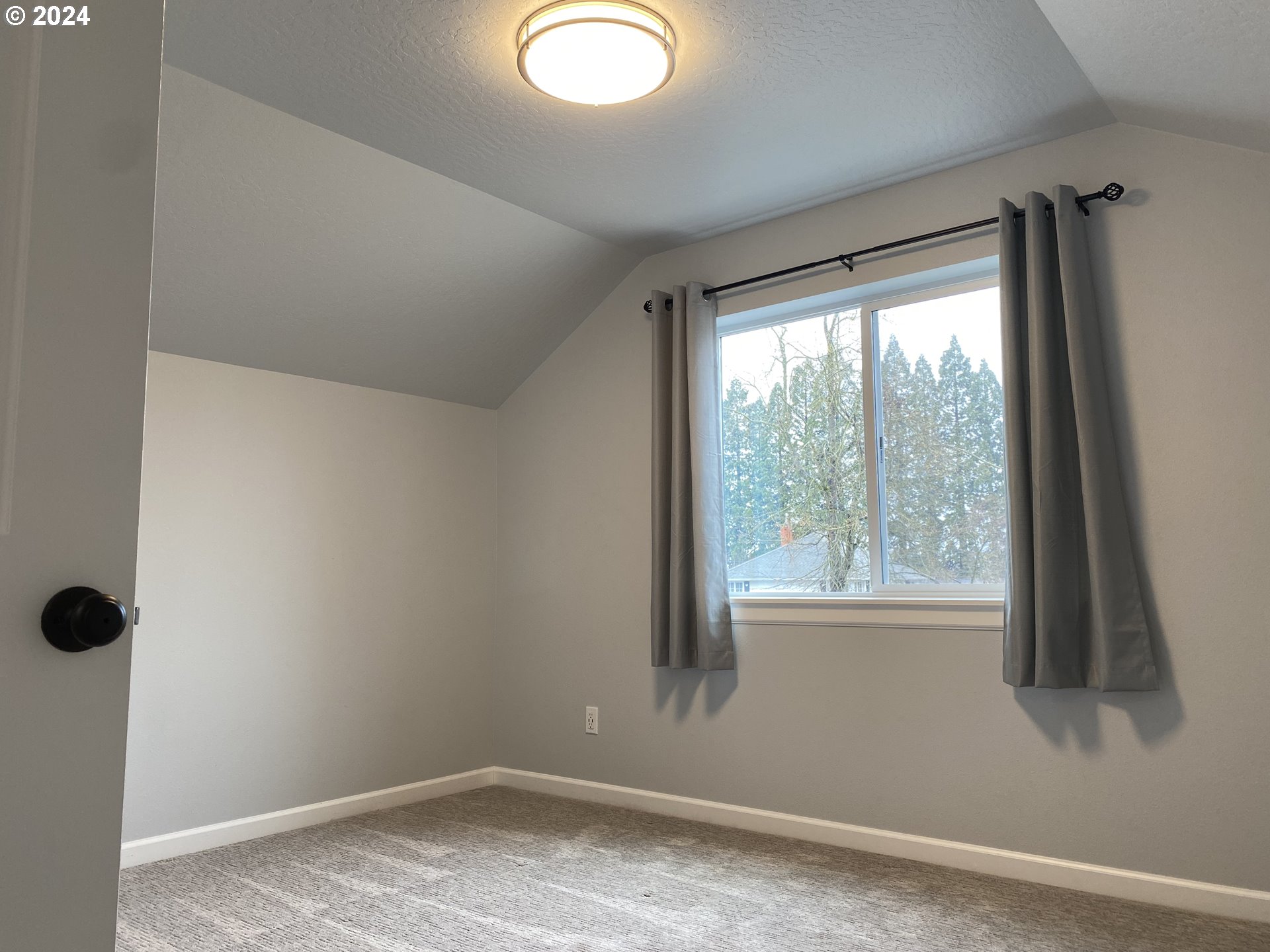 1265 F Street Springfield, OR 97477 - Photo 8 of 32 a view of a livingroom with a window
