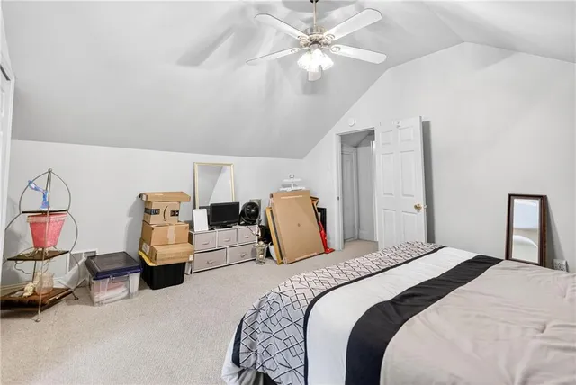 a view of a patio with table and chairs and potted plants