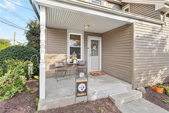 a kitchen with stainless steel appliances granite countertop a refrigerator stove microwave and sink