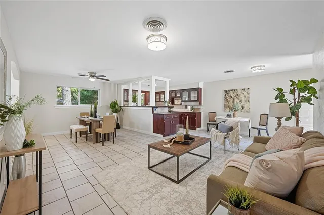 a living room with furniture and a table