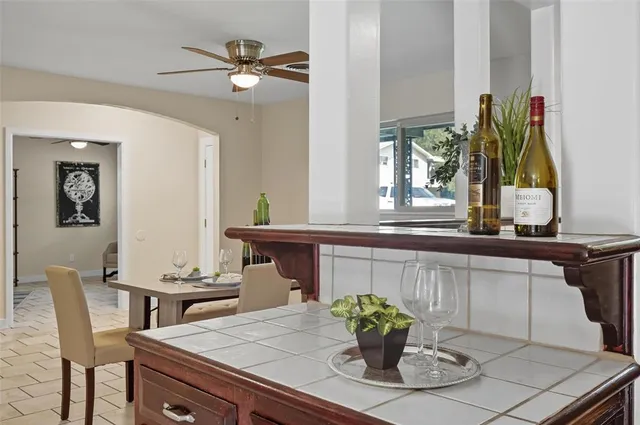 a kitchen that has a sink and a stove