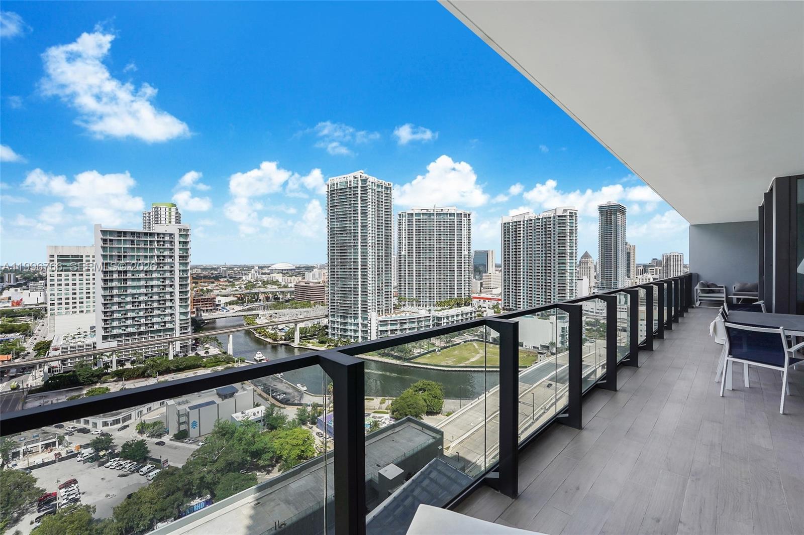 68 Southeast 6th Street, Unit 2104 Miami, FL 33131 - Photo 1 of 33 a view of city from balcony