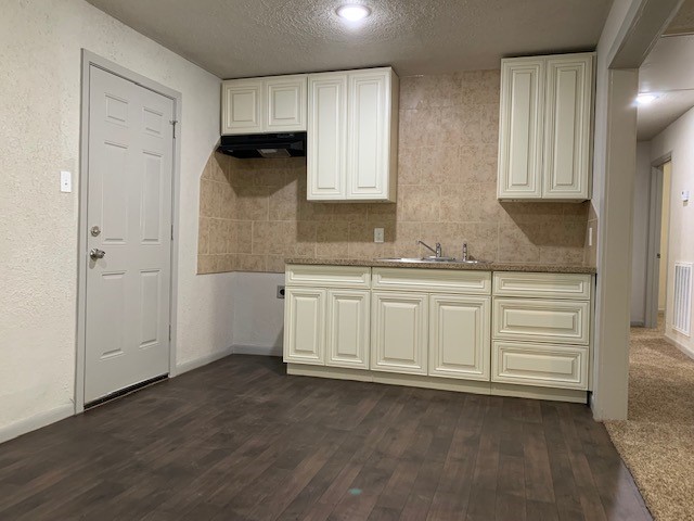 3107 Friar Point Road Houston, TX 77051 - Photo 3 of 9 a kitchen with a sink and cabinets