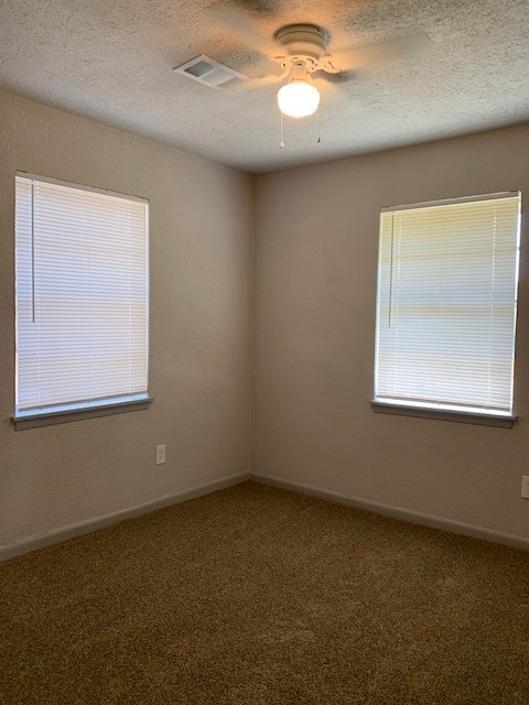3107 Friar Point Road Houston, TX 77051 - Photo 6 of 9 an empty room with a window