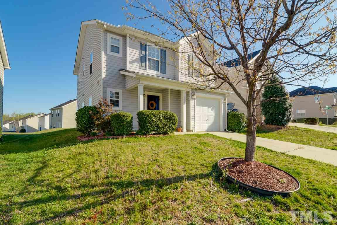 3677 Marshlane Way Raleigh, NC 27610 - Photo 1 of 24 a front view of a house with a yard