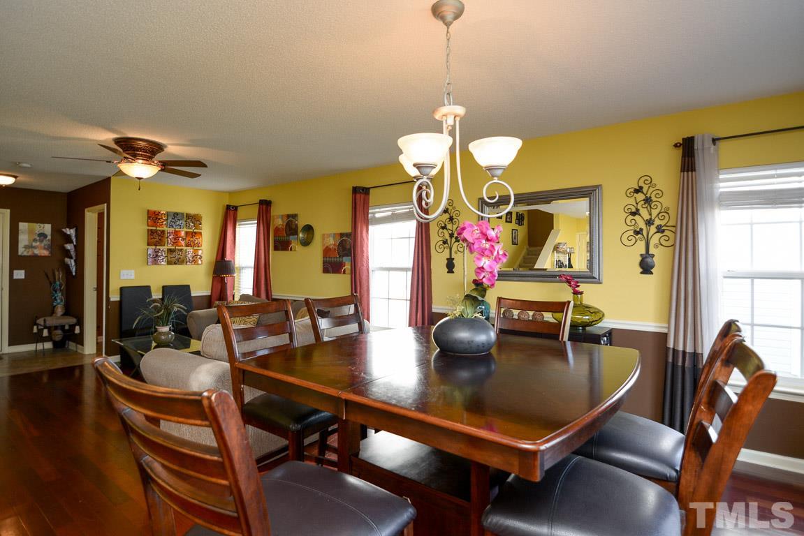 3677 Marshlane Way Raleigh, NC 27610 - Photo 9 of 24 a view of a dining room with furniture