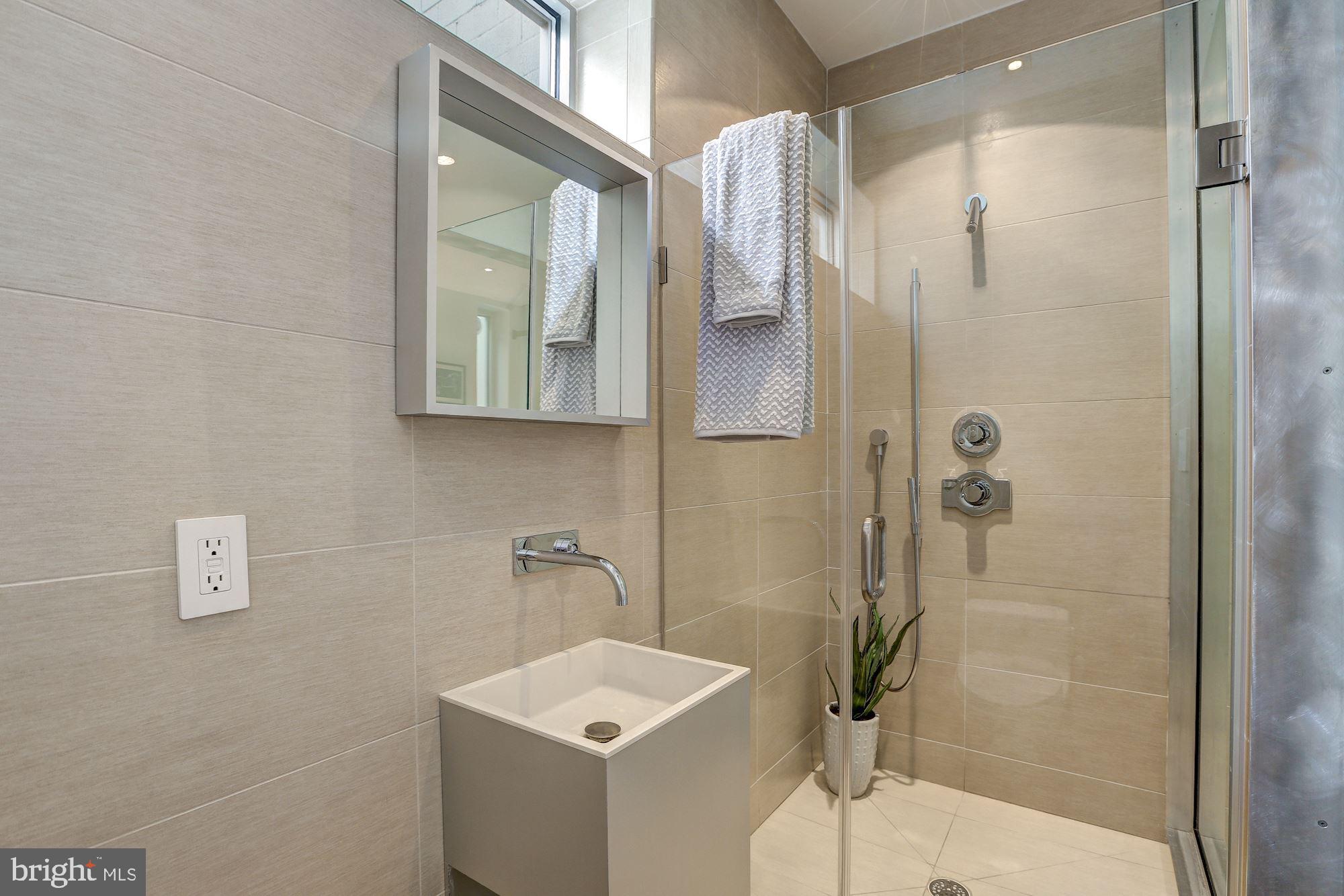 1024 W Street Northwest Washington, DC 20001 - Photo 26 of 37 Guest Bathrooms