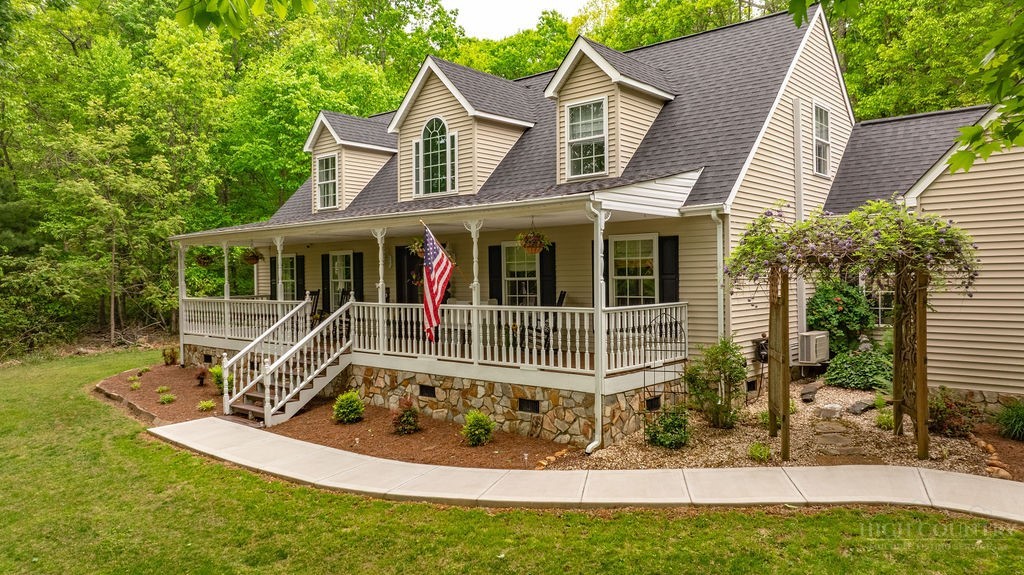 970 Vox Road Sparta, NC 28675 - Photo 7 of 50 a view of house with a yard