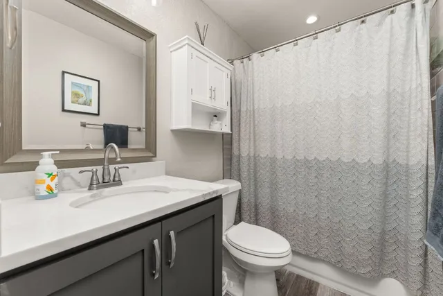 a view of swimming pool from a balcony