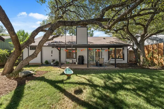a front view of a house with patio