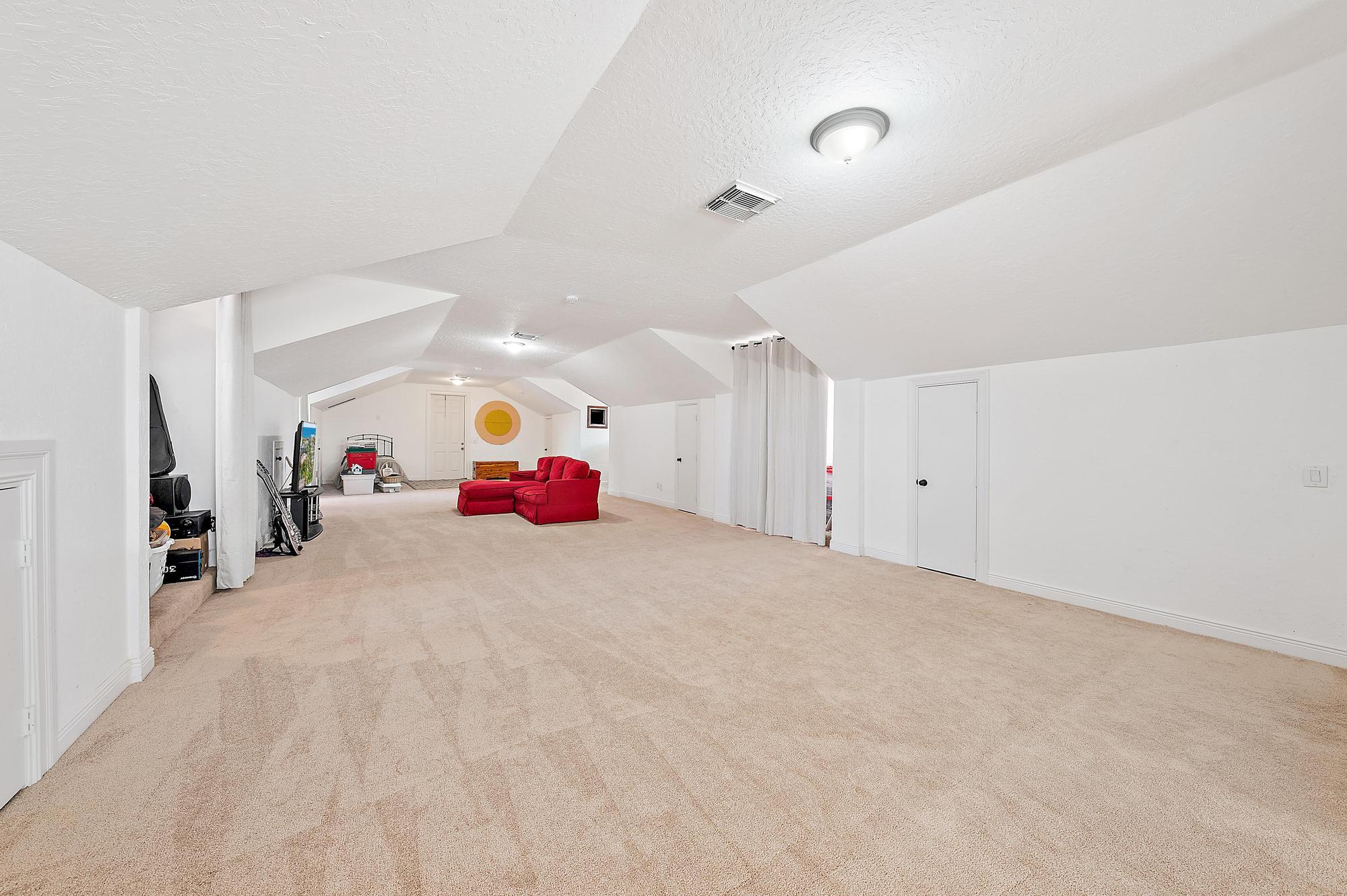 18137 Palm Point Drive Jupiter, FL 33458 - Photo 69 of 92 3rd floor loft