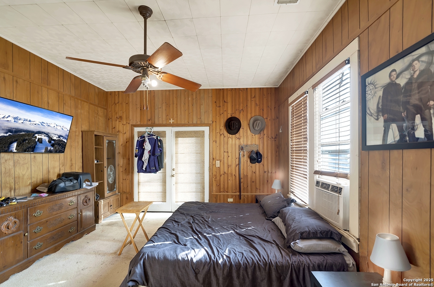612 East Guadalupe Street Runge, TX 78151 - Photo 22 of 44 a bedroom with a bed dresser and a window