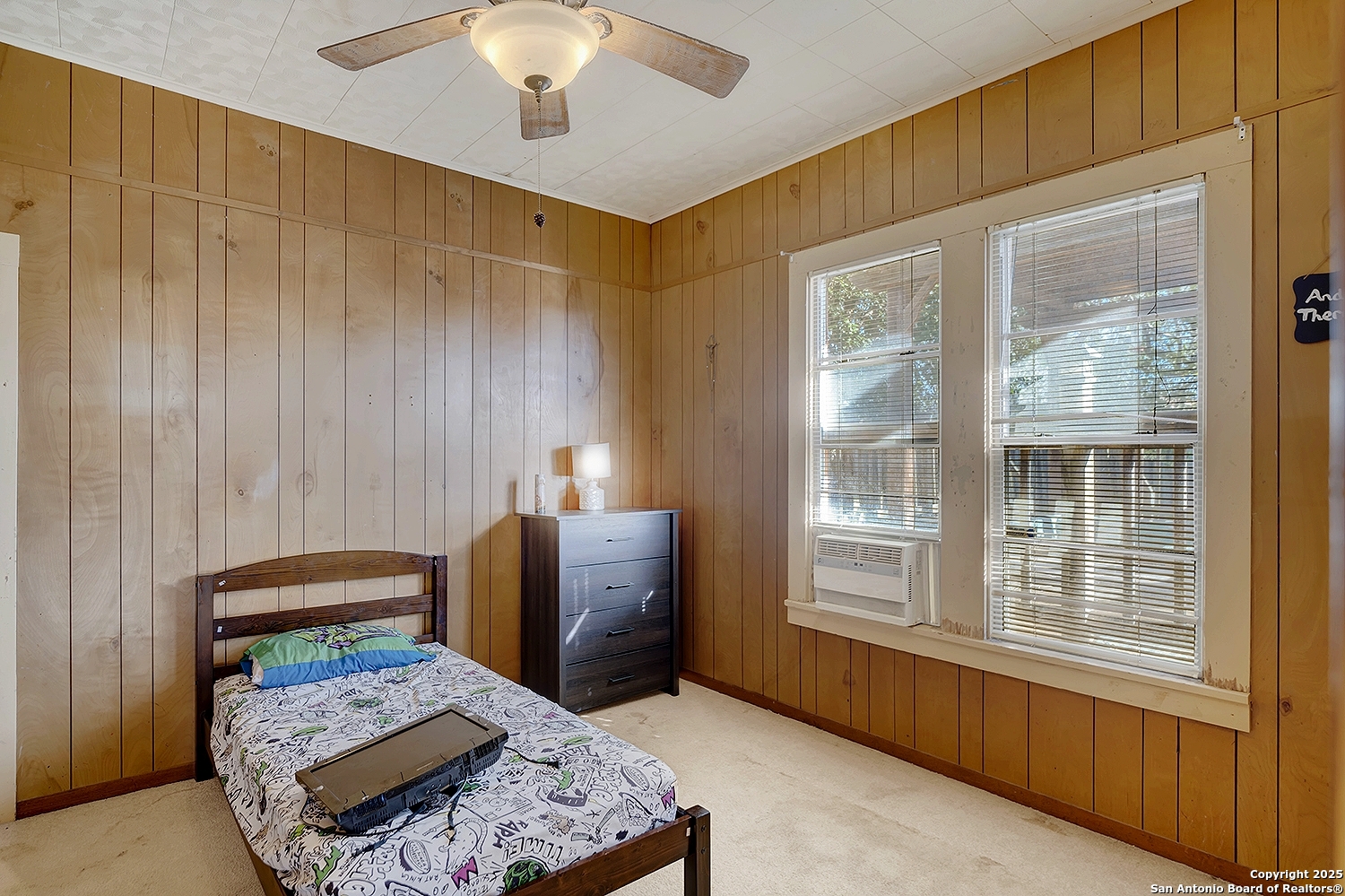 612 East Guadalupe Street Runge, TX 78151 - Photo 26 of 44 a bedroom with furniture and a window