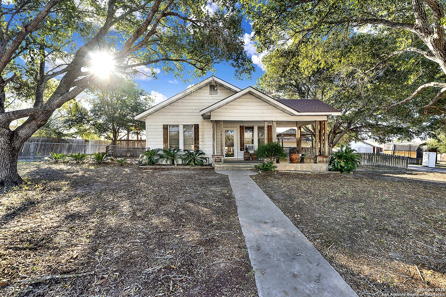 612 East Guadalupe Street Runge, TX 78151 - Photo 3 of 44 a view of a town with large trees and large trees