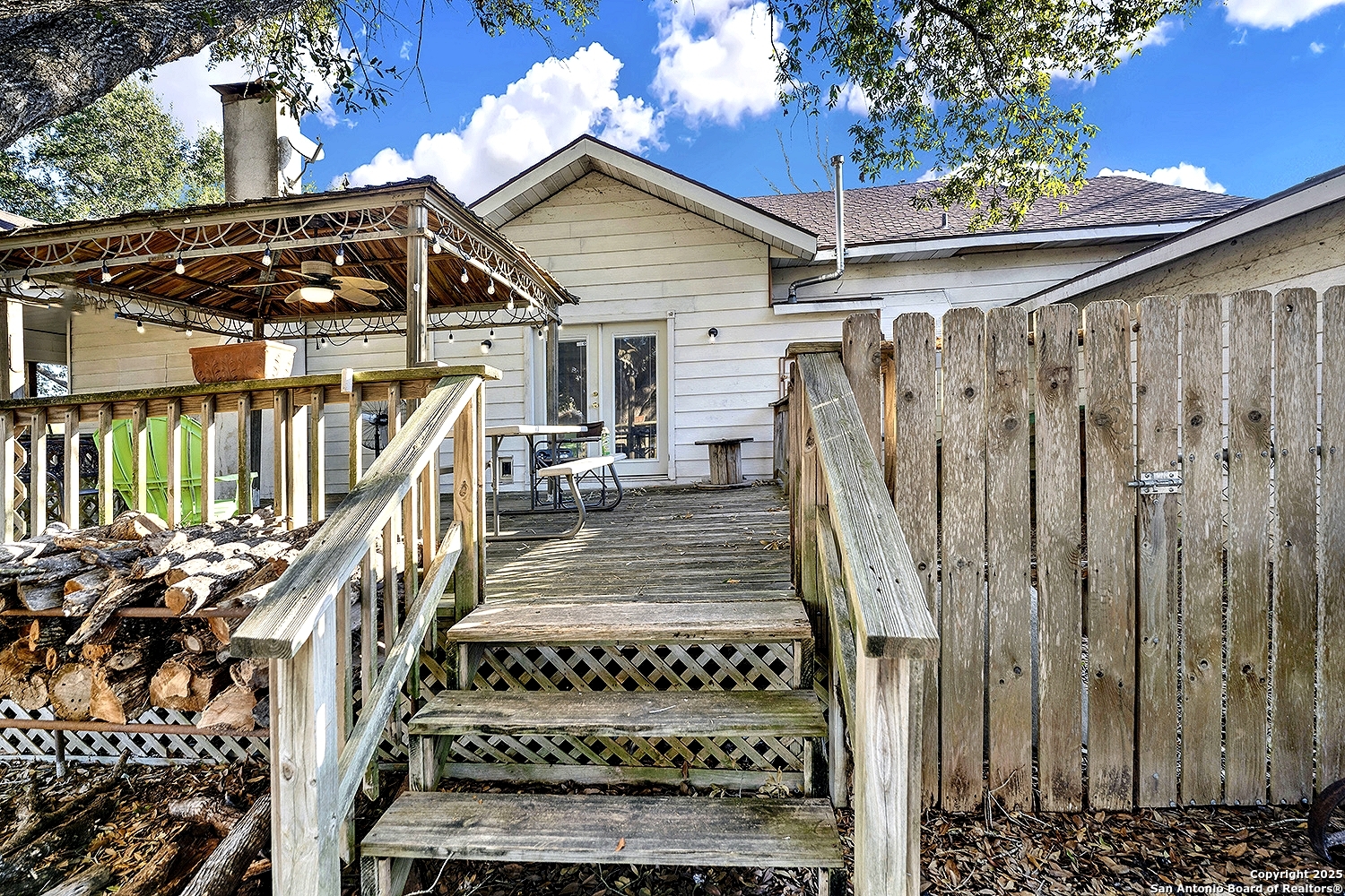 612 East Guadalupe Street Runge, TX 78151 - Photo 34 of 44 a view of a house with a balcony