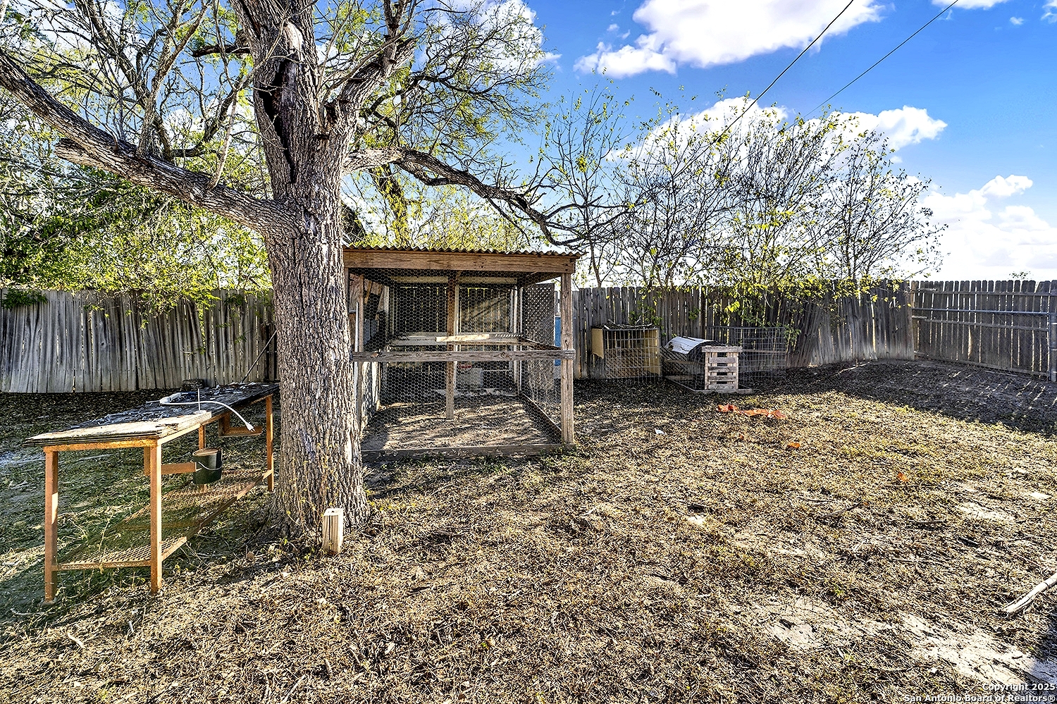 612 East Guadalupe Street Runge, TX 78151 - Photo 35 of 44 a backyard of a house with barbeque oven