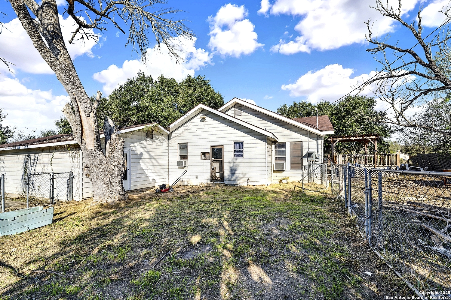 612 East Guadalupe Street Runge, TX 78151 - Photo 37 of 44 a view of a house with a yard