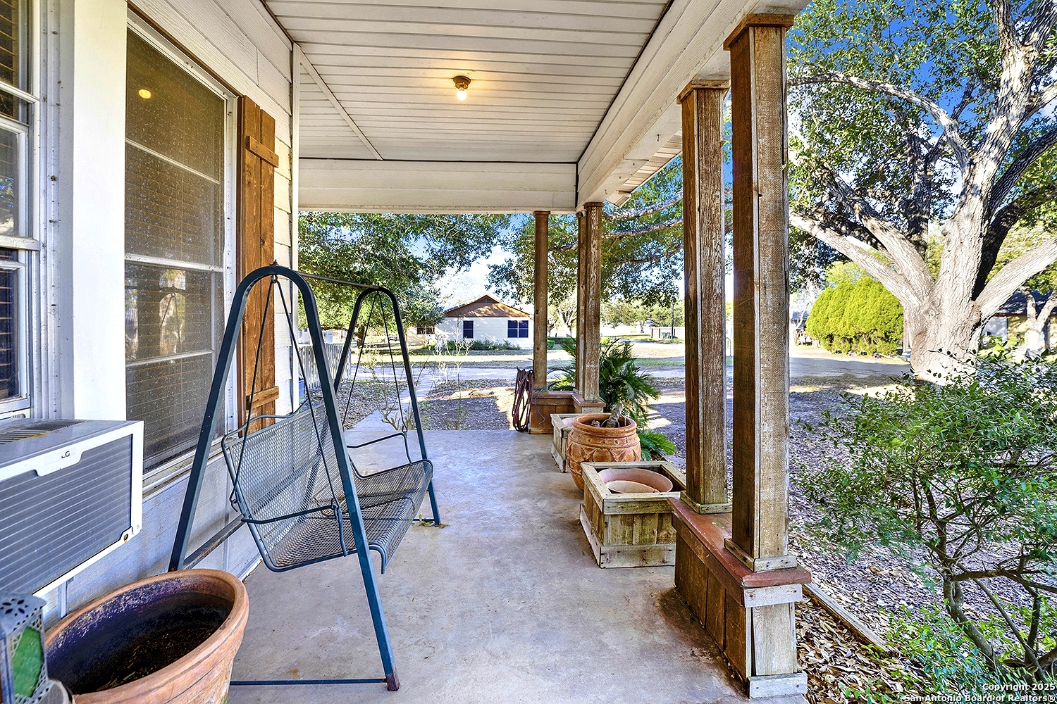 612 East Guadalupe Street Runge, TX 78151 - Photo 9 of 44 a view of balcony with chairs and iron fence