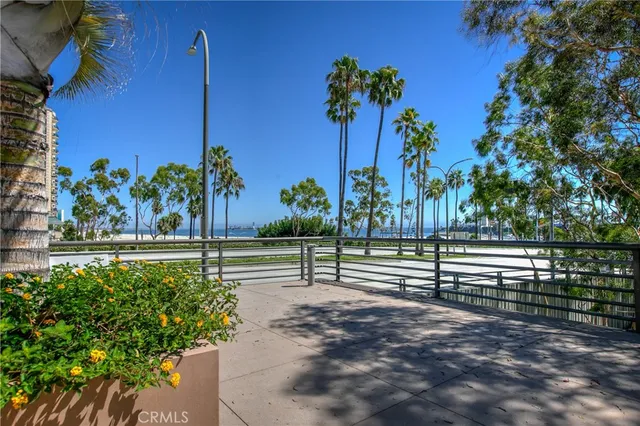 a view of a patio with a table and chairs