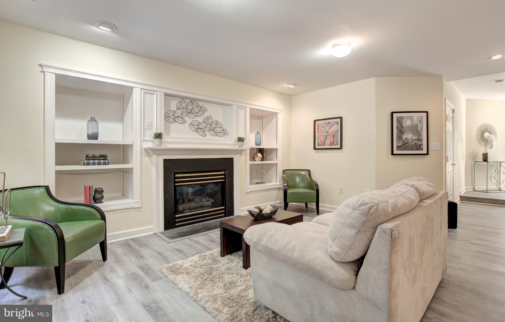 6331 Simmer Circle Springfield, VA 22150 - Photo 4 of 41 Entry Level has cozy fireplace