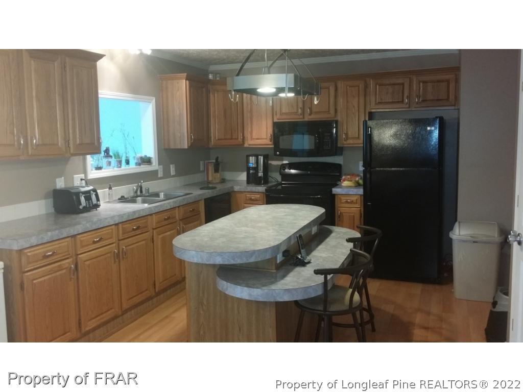 8039 Arabia Road Lumber Bridge, NC 28357 - Photo 3 of 27 Gallery Image 3
