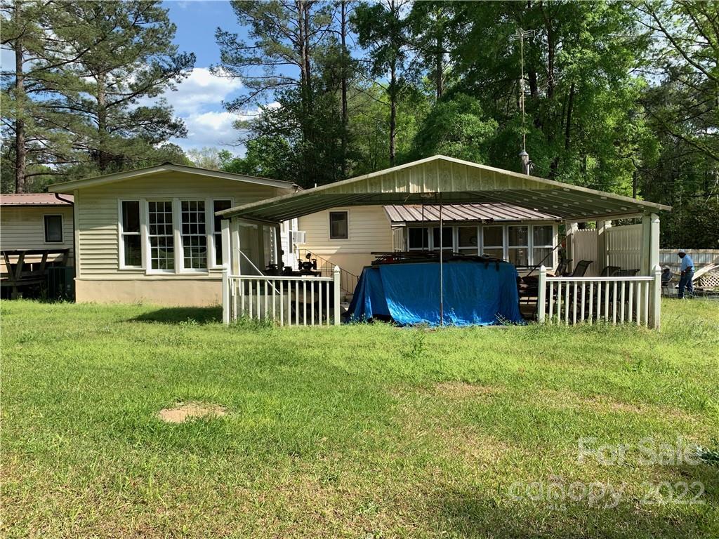 217 Boswell Road Columbia, SC 29203 - Photo 21 of 28 a view of a house with a yard and fence