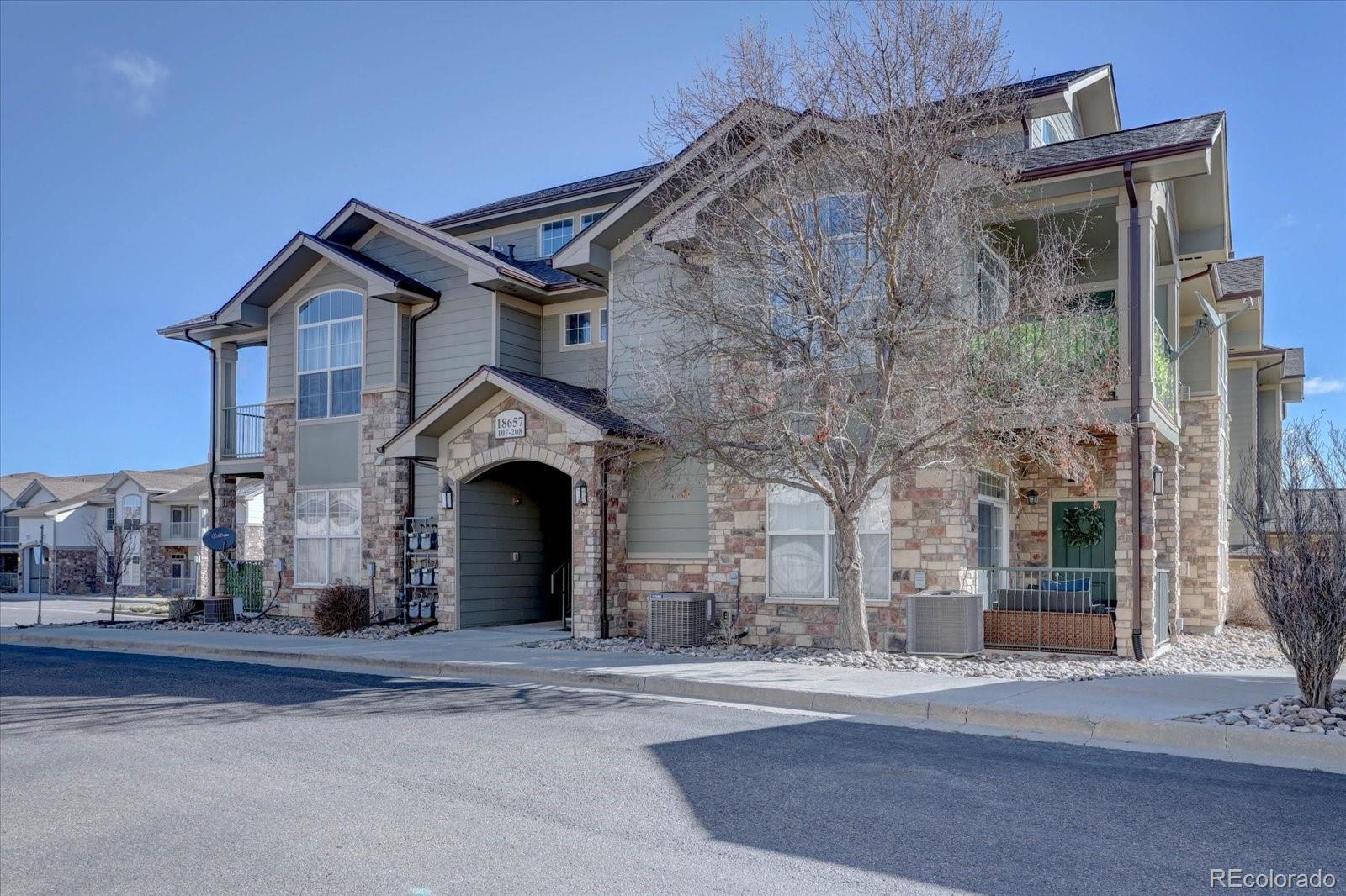18657 Stroh Road, Unit 4107 Parker, CO 80134 - Photo 23 of 25 a view of a building with a pathway