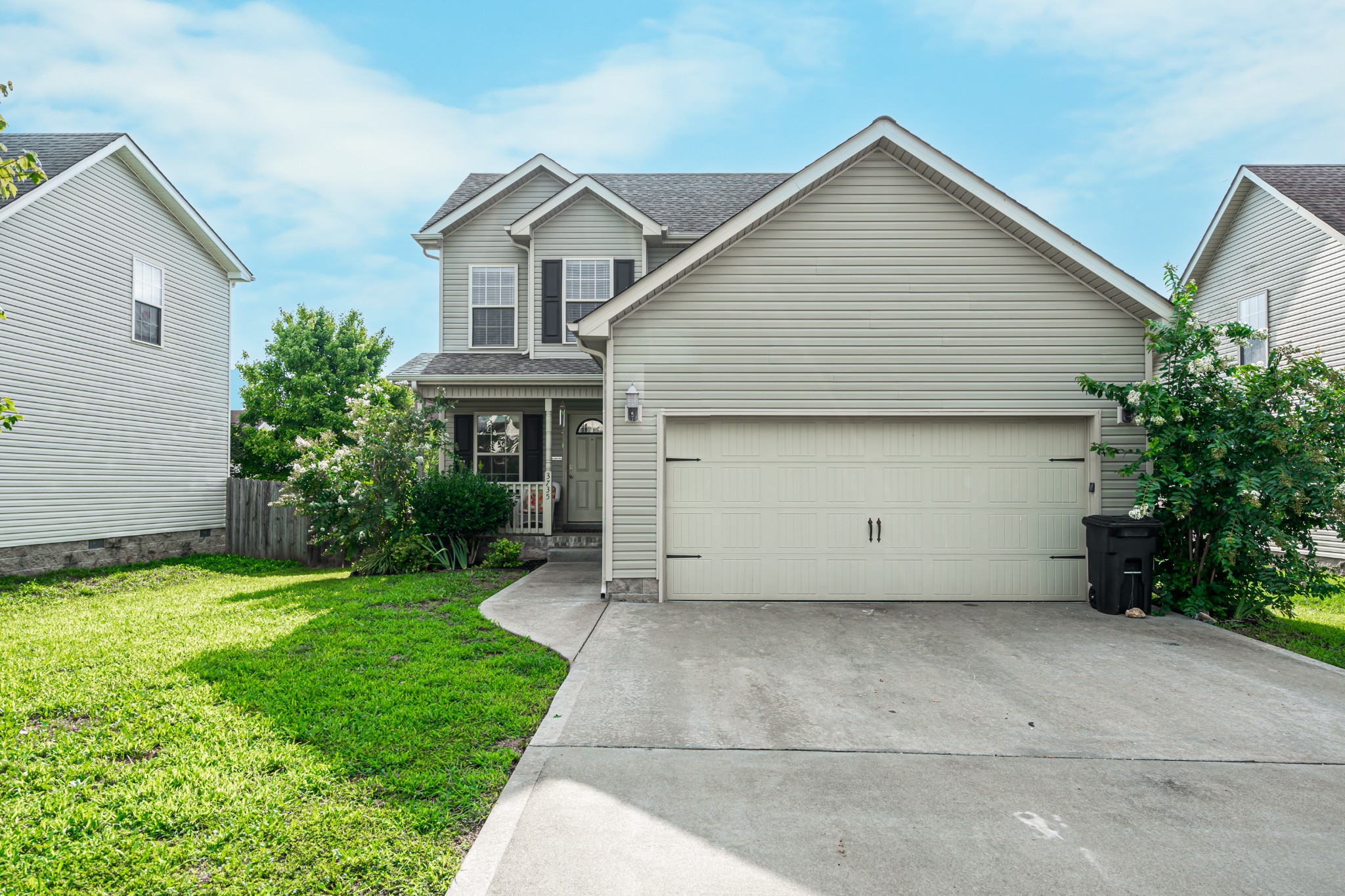3735 Suiter Road Clarksville, TN 37040 - Photo 1 of 22 a view of a house with a yard and garage