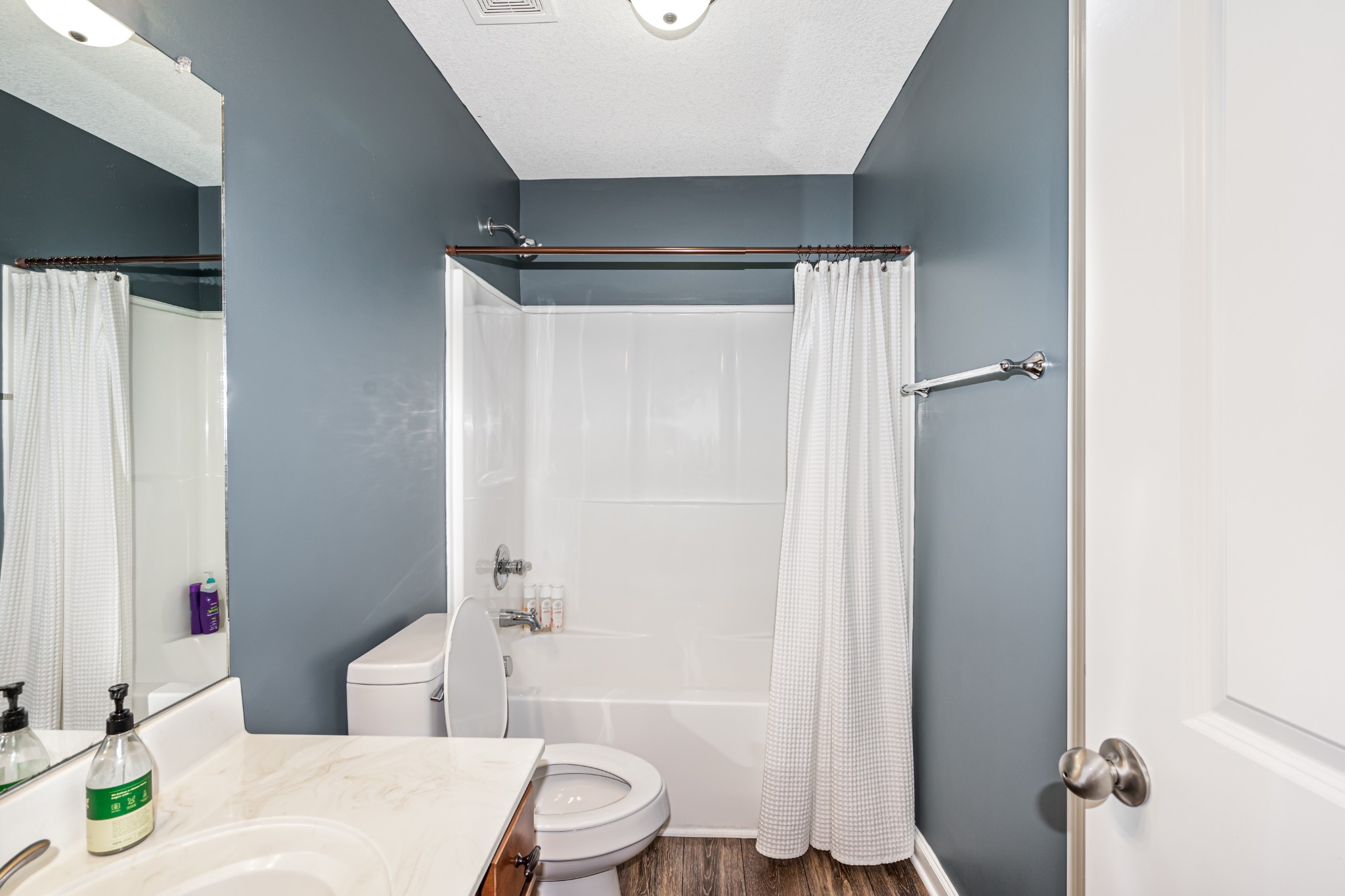 3735 Suiter Road Clarksville, TN 37040 - Photo 11 of 22 a bathroom with a sink toilet and shower