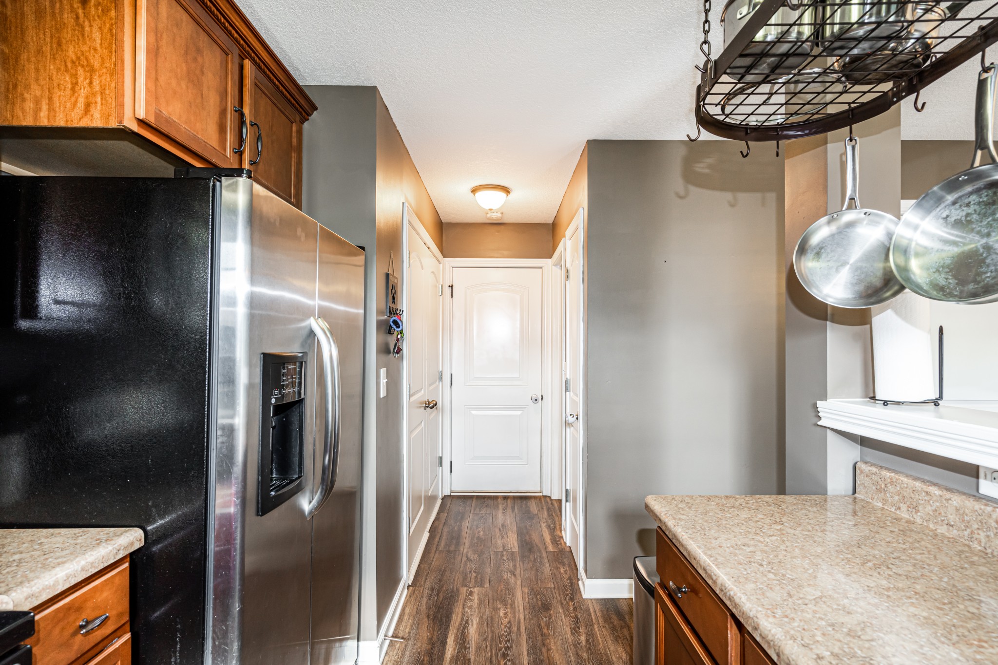 3735 Suiter Road Clarksville, TN 37040 - Photo 16 of 22 a kitchen with stainless steel appliances granite countertop a refrigerator a stove and a sink