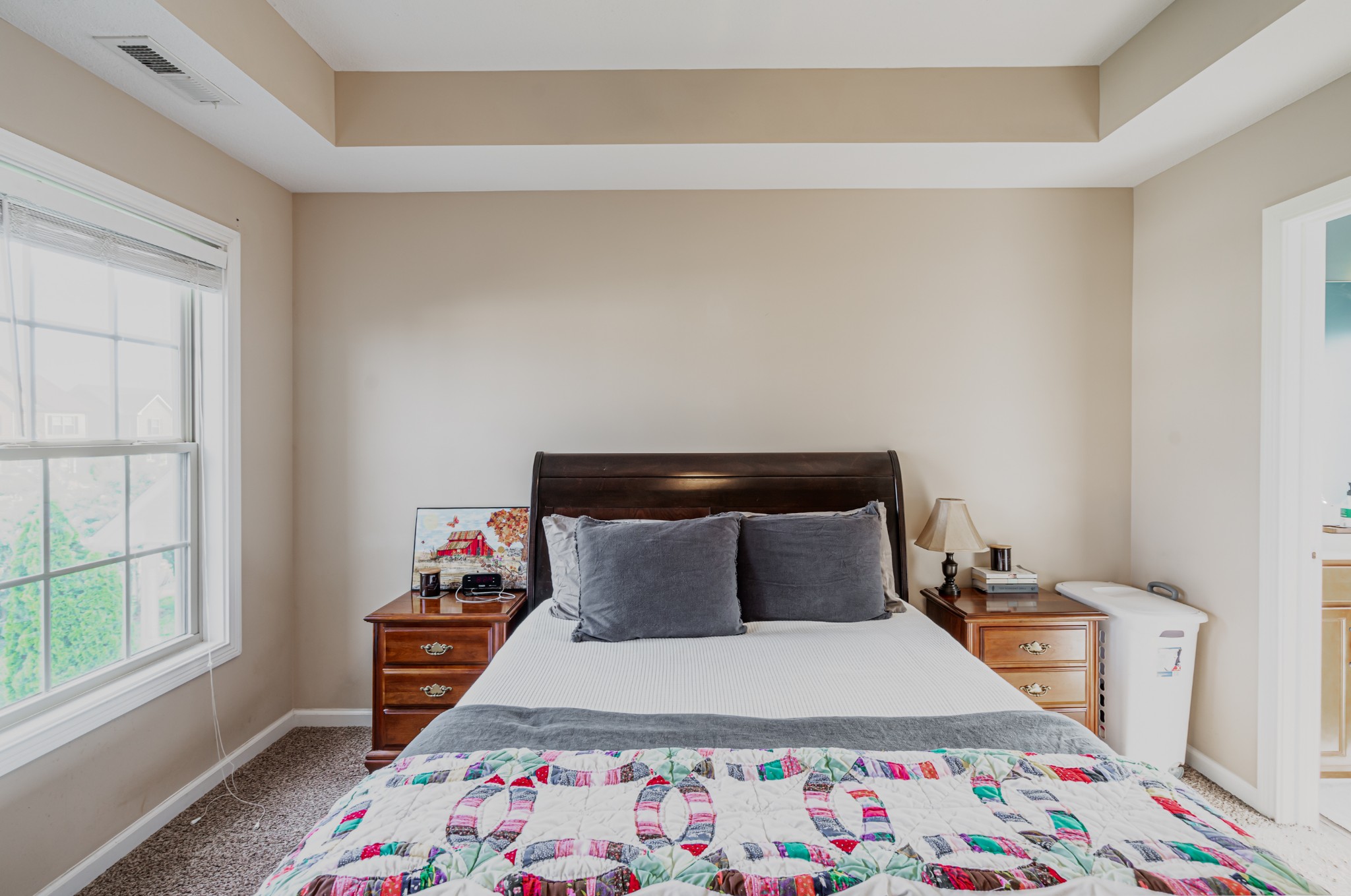 3735 Suiter Road Clarksville, TN 37040 - Photo 4 of 22 a bedroom with a bed and wooden floor