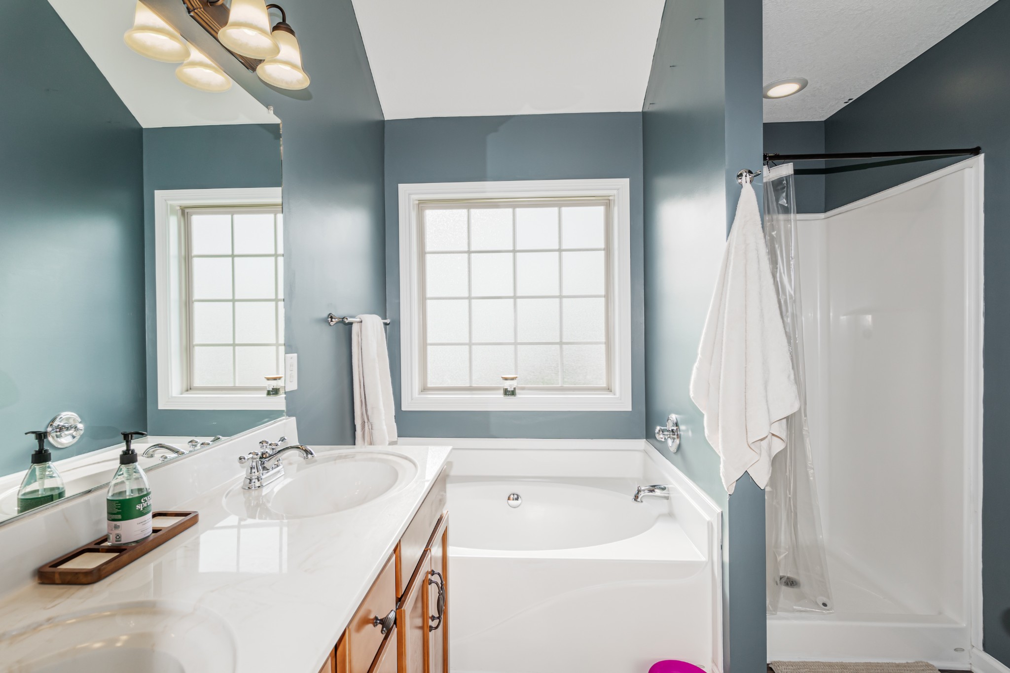 3735 Suiter Road Clarksville, TN 37040 - Photo 7 of 22 a bathroom with a tub sink and mirror