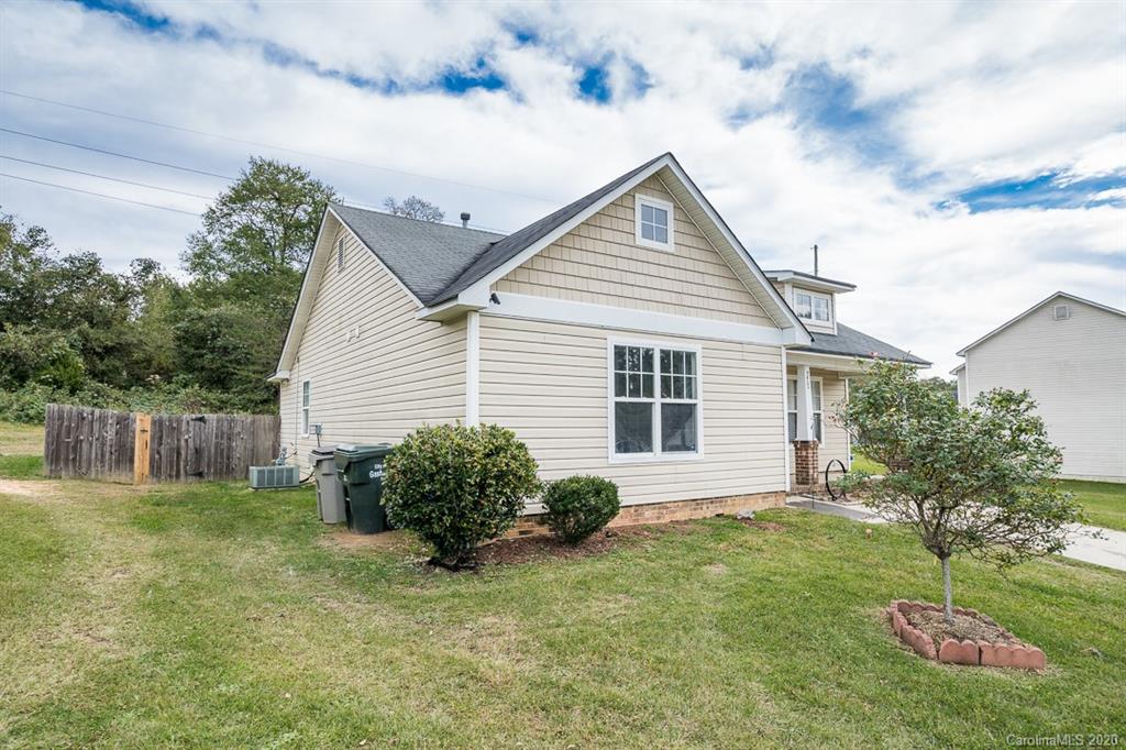 772 Raindrops Road Gastonia, NC 28054 - Photo 3 of 28 a view of a house with a yard and plants