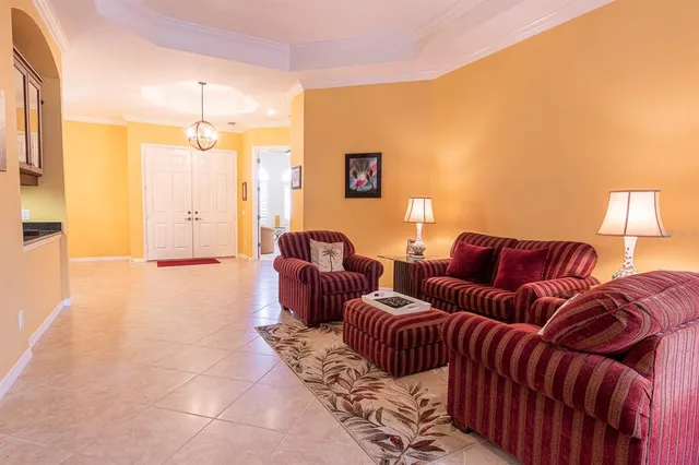 a bathroom with a granite countertop sink toilet and mirror