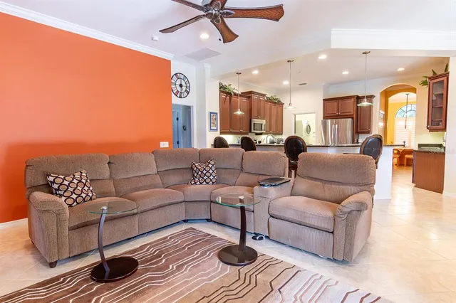 a spacious bedroom with a bed and a window