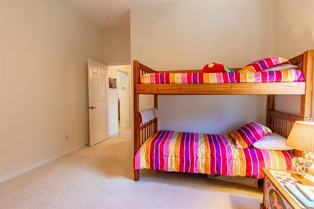a view of a patio with dining table and chairs