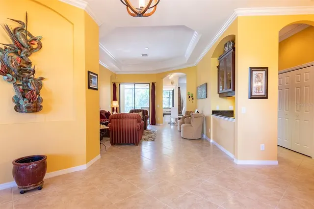 a view of a room with furniture window and wooden floor