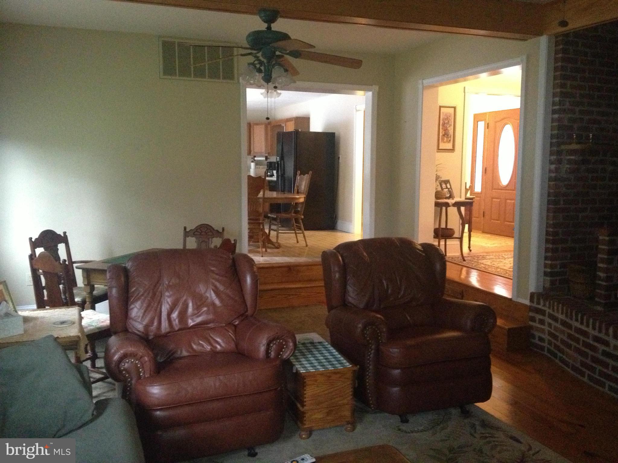 50295 Fresh Pond Neck Road Ridge, MD 20680 - Photo 9 of 10 a living room with furniture and a window