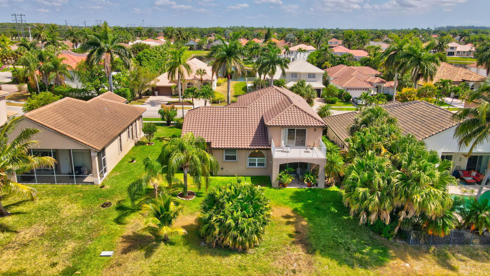 19586 Dinner Key Drive Boca Raton, FL 33498 - Photo 12 of 78 a aerial view of a house with a yard and plants