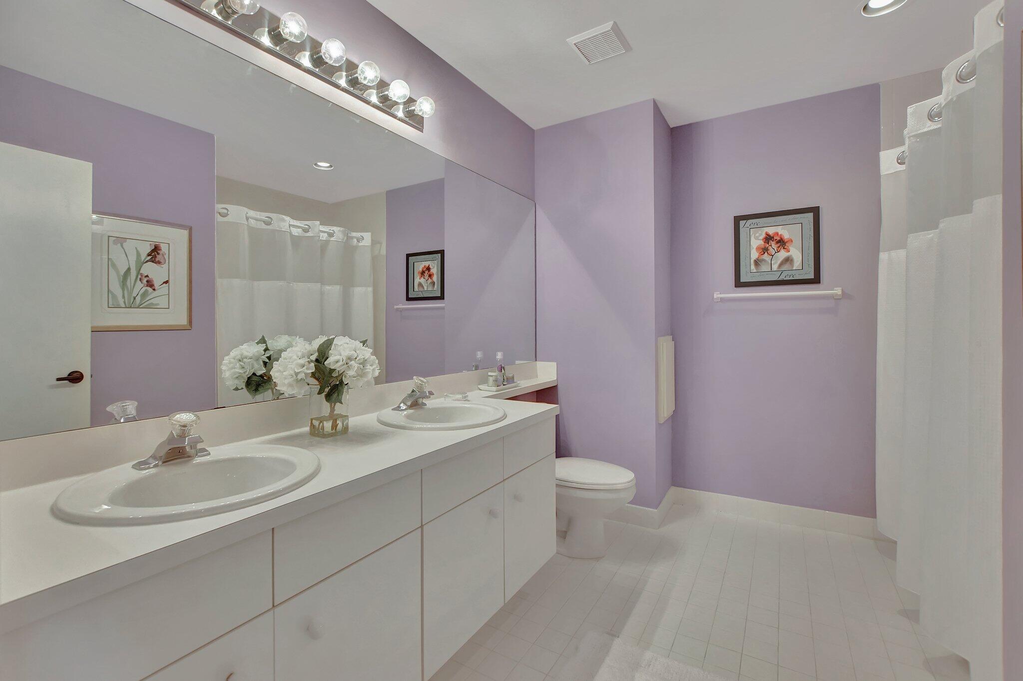 19586 Dinner Key Drive Boca Raton, FL 33498 - Photo 45 of 78 a bathroom with a sink and a mirror