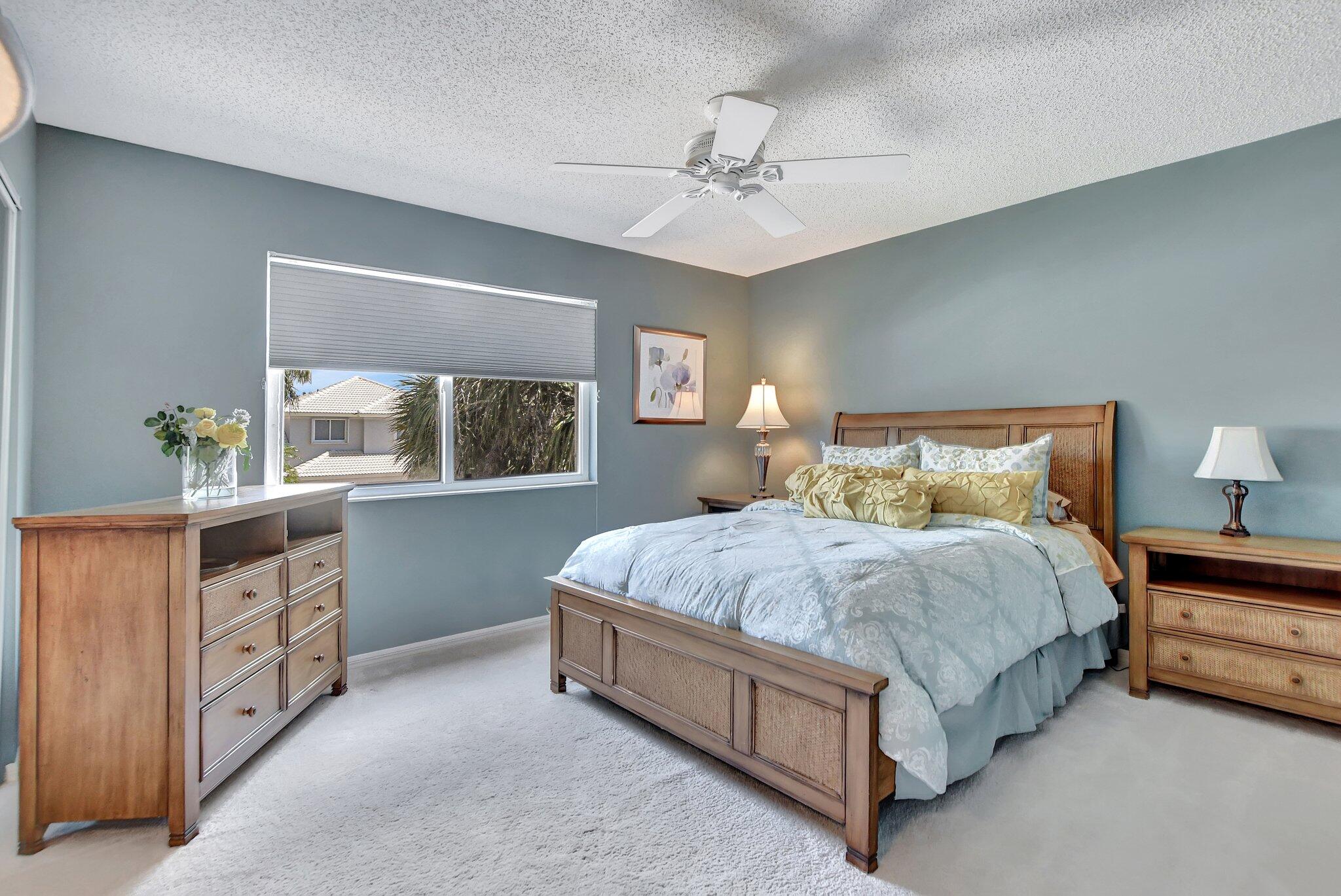 19586 Dinner Key Drive Boca Raton, FL 33498 - Photo 47 of 78 a spacious bedroom with a bed and a window