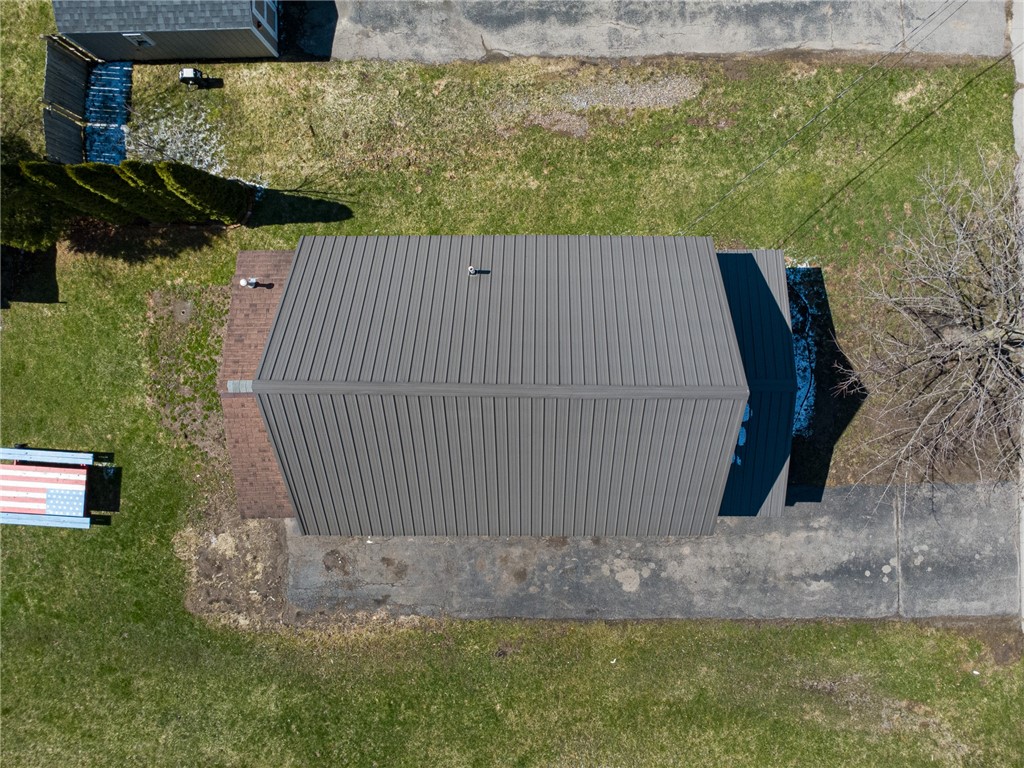 4024 Ridgeway Street Williamson, NY 14589 - Photo 4 of 28 Check out the METAL ROOF! For years of worry free