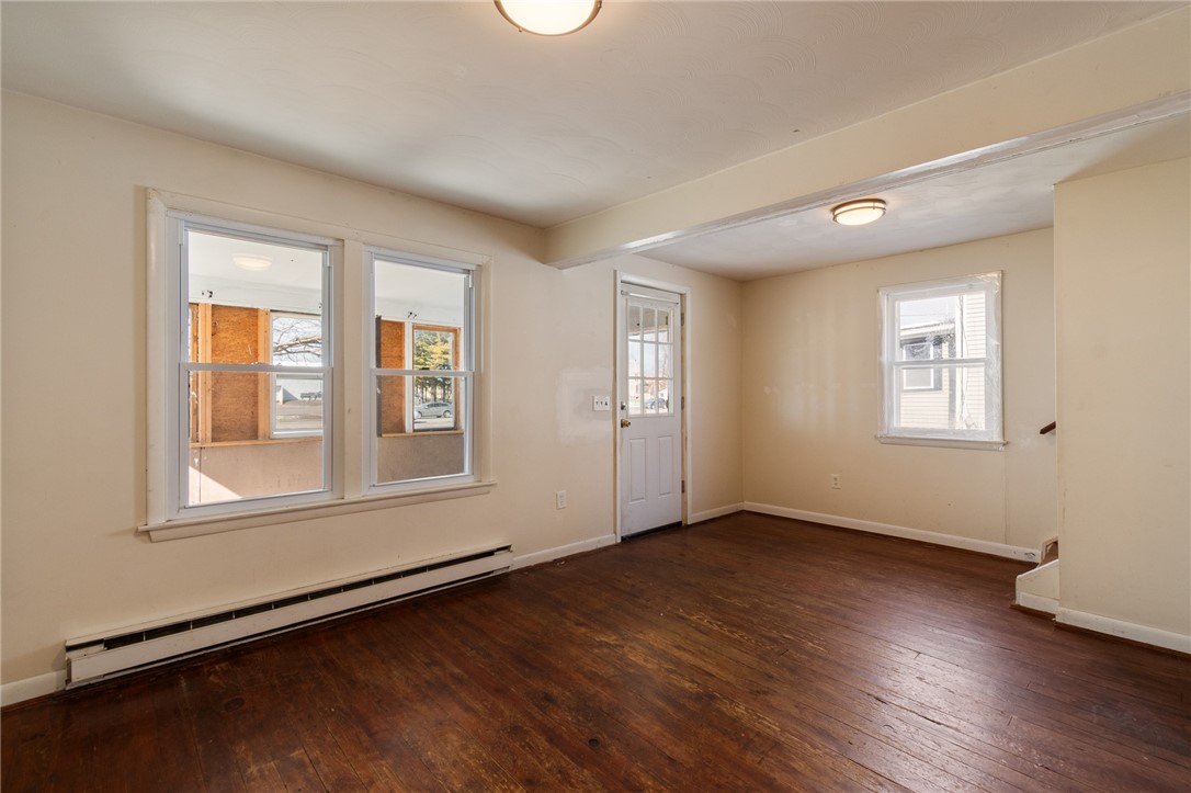 4024 Ridgeway Street Williamson, NY 14589 - Photo 8 of 28 The living room with a VIEW to the ENCLOSED FRONT
